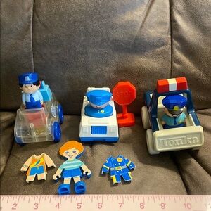 Vintage bundle policeman and police cars.